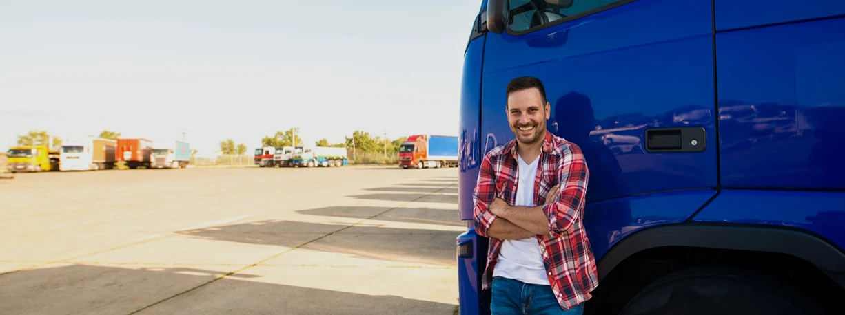 Driver beside truck